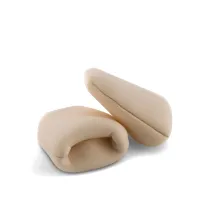 Two beige, foam wine bottle protectors are lying on a white surface, one open and one closed, designed to safeguard wine bottles during transport.