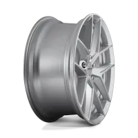 A silver, multi-spoke automotive wheel rim stands alone against a white and grey background. The center cap reads "rotiform."