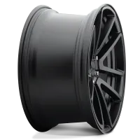 A black, multi-spoke car wheel rim is shown in close-up, highlighting its sleek design and smooth finish; positioned against a plain, light background.