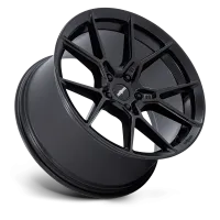 A black alloy car wheel displayed against a plain background, featuring a multi-spoke design with the word “rotiform” on the center cap and spokes.