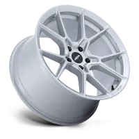 A silver, multi-spoke car wheel rim positioned at an angle, floating against a plain black background. The center cap displays the text "rotiform."