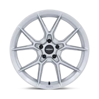 A silver, multi-spoke automotive wheel standing upright against a black background. The wheel features the text "rotiform" prominently on the center cap and the rim.
