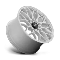 A white alloy wheel with intricate, overlapping spokes is displayed against a plain background. The center cap features the text "rotiform" on a black surface.