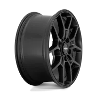 A matte black alloy wheel with multiple spokes bears the logo "rotiform" at its center, positioned against a solid white backdrop.