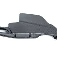 Carbon fiber car engine cover positioned on a white background, showcasing its sleek, textured design and contoured edges, emphasizing its lightweight and robust characteristics.