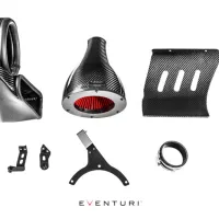 A collection of Eventuri carbon fiber automotive parts, including air intake components, mounts, and brackets, arranged on a white background.