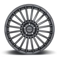 A metallic alloy wheel with multiple spokes radiating from the center, which features the brand name "Rotiform." The background is plain white and the wheel is primarily dark gray.