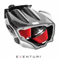 Dual red air filters enclosed in a carbon fiber housing. Surrounding environment is a white background. Text present: "EVENTURI" displayed below the object.