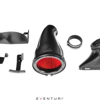 A disassembled car intake system features a carbon fiber air filter housing, red cone filter, metal brackets, and clamps on a white background. Text: "EVENTURI™".