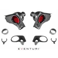 An assortment of car air intake components, including carbon fiber intake ducts with red filters, flexible hoses, and various mounting brackets, arranged symmetrically on a white background. Text: "EVENTURI."