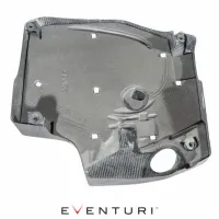 A carbon fiber engine cover with "EVNTURI" text at the bottom, featuring multiple cutouts and mounting points. The context is a clean white backdrop and "PUR" imprint on the cover.
