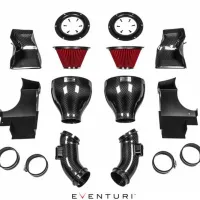 Automotive air intake system components, including red cone filters, black carbon fiber tubes, and various mounting parts organized on a white background. Text is "EVENTURI" at the bottom.