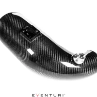 A glossy black carbon fiber car intake pipe lies diagonally on a white background. At the bottom center, "Eventuri™" is printed in black and red.
