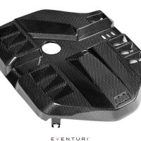 Carbon fiber engine cover with a central circular cutout, intricate geometric patterns, and text "EVENTURI" below, isolated against a white background.