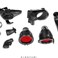 Carbon fiber automotive air intake components, including ducts, cones, and tubes, are displayed on a white background. Two primary filters with red pleats are prominent. Text: "EVENTURI" at the bottom center.
