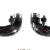 Two carbon fiber intake pipes with black fittings and clear ends are displayed against a white background. Red checkmarks are visible on both pipes. The text reads "Eventuri."