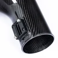 A carbon fiber tube with a black metal mounting bracket, featuring four screws, is positioned against a plain white background. The bracket is labeled "MCH."