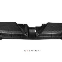 A black carbon fiber car engine cover with grooves and contours lies against a white background. Below the cover, the text "EVENTURI" is written.