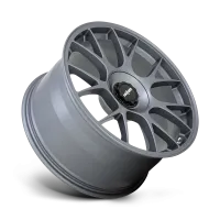 A matte gray car wheel rim with seven pairs of spokes, displaying the text "rotiform" in white on a black center cap, isolated against a white and black gradient background.