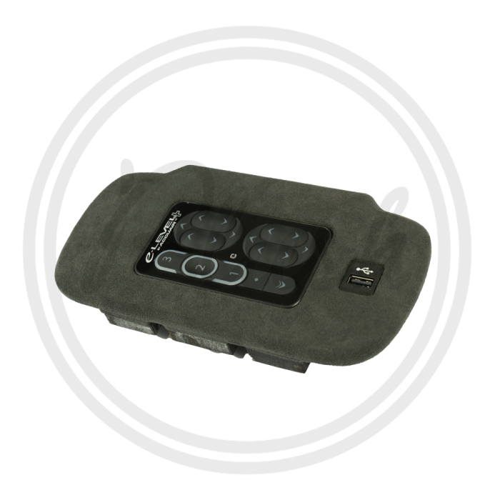 A black electronic dashboard control panel with buttons, marked "e-Level" and "auto-", integrated into a dark, textured fabric cushioning, set against a white background with a faint circular pattern.