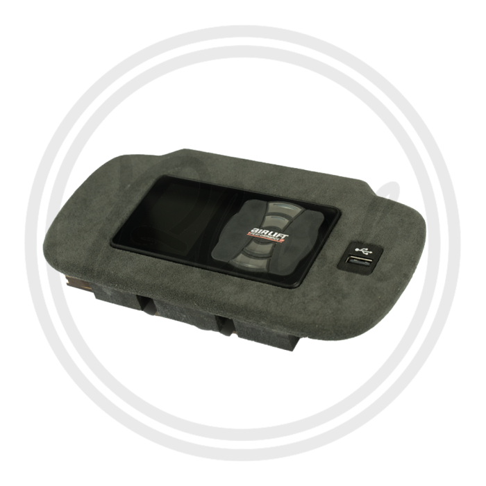 Rectangular device with a small screen and illuminated controls labeled "AIRLIFT." The device is housed in a gray, cushioned material, featuring a USB port button, resting on a plain background.