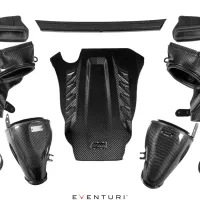 Carbon fiber automotive intake components arranged on a white background, including ducts, shields, and pipes. Below the parts, the text shows "EVENTURI™".