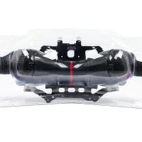 Carbon fiber air intake system encased in a transparent plastic bag, placed on a white background.