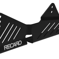 A black metal bracket with multiple diagonal cut-out slots and the text "RECARO" inscribed on it, positioned against a plain white background.