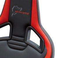 A racing seat in black with red accents and embroidered logos that read "RECARO" and "nürburgring" with a track outline, set against a white background.