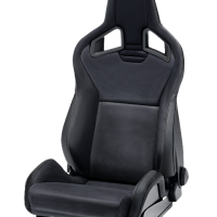 A black, high-backed car seat with side bolsters and "RECARO" embossed on the upper backrest, shown in an isolated setting.