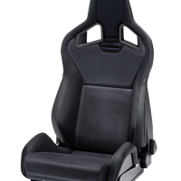 Black racing car seat with a high backrest and side bolsters, featuring a recline adjustment knob on the side, set against a plain white background.