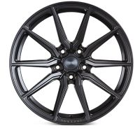 A sleek, black alloy wheel featuring five double spokes radiates outward. The center cap displays the text "Vossen Forged" in a clean, minimalist design on a white background.