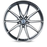 A sleek, multi-spoke alloy wheel with a polished finish features a center cap labeled "VOSSEN FORGED." The wheel rests against a white background, displaying a modern design.