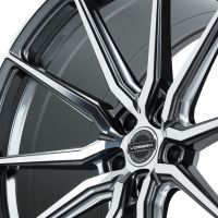 A detailed view of a Vossen alloy wheel with a modern, sleek design featuring multiple angular spokes extending from a central hub. The hub displays the text: "VOSSEN FORGED" and "DESIGNED FORGED ENGINEERED IN MIAMI, FL USA."