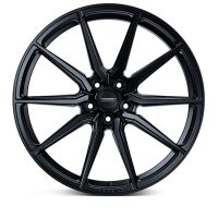A black, multi-spoke alloy wheel is displayed against a white background. Center cap text reads: "VOSSEN FORGED." The design is sleek and symmetrical.