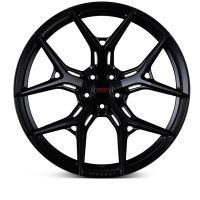 A black, multi-spoke alloy wheel, stationary against a white background. The center hub features the text: "VOSSEN FORGED."