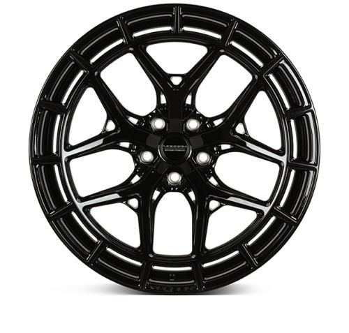A glossy black alloy wheel with a multi-spoke design is displayed against a white background. The center cap features the logo "Vossen Forged."