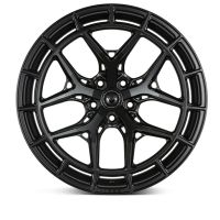 A black alloy wheel featuring a complex, multi-spoke design displayed against a plain, white background. The brand name "AXEON" is visible near the bottom.