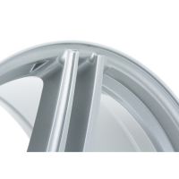 A silver metallic wheel rim, featuring a sleek, curved design with two prominent spokes, is displayed against a plain white background.