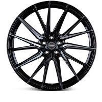 A glossy black alloy wheel with intricate spoke design, featuring a central cap with the text "VOSSEN FORGED," stands against a plain white background.