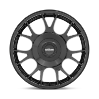 A black alloy wheel with intricate spokes features the logo "rotiform" in the center. The wheel is shown on a plain, neutral background.